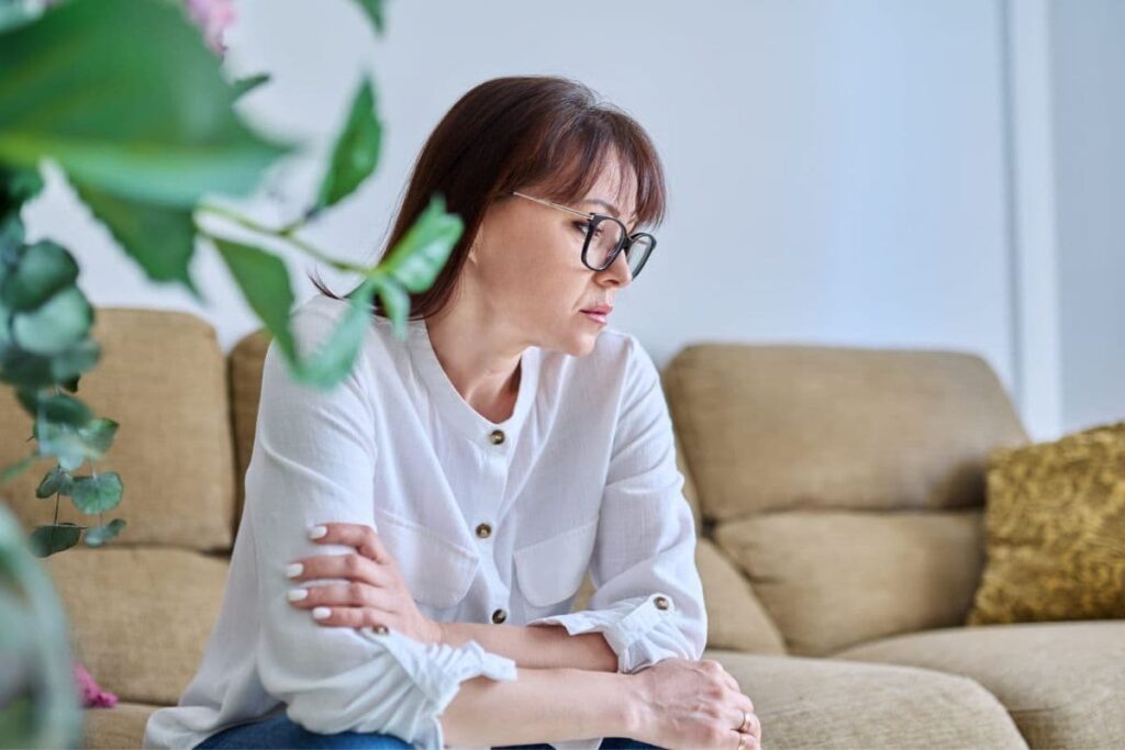 woman overwhelmed that her house is making her sick