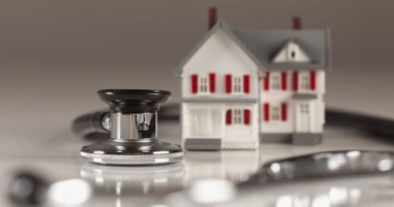 House with a stethoscope around int