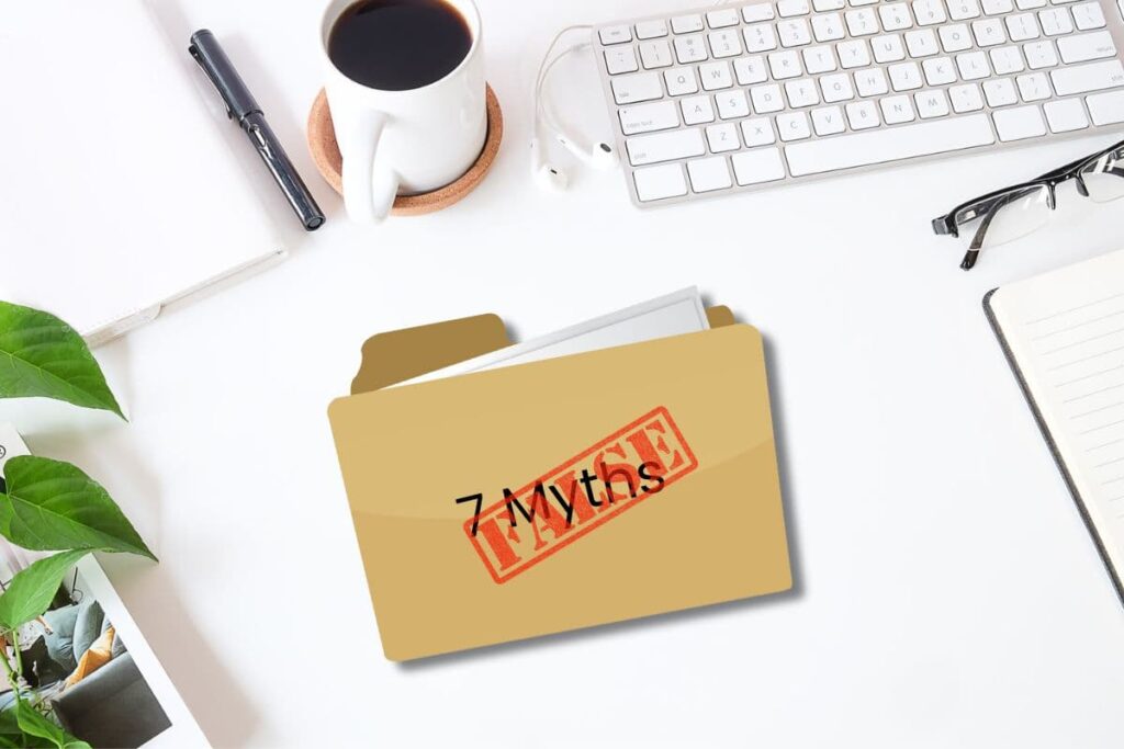 Desk with folder marked 7 myths "FALSE"