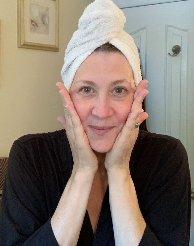Tina applying moisturizer, Step 4.