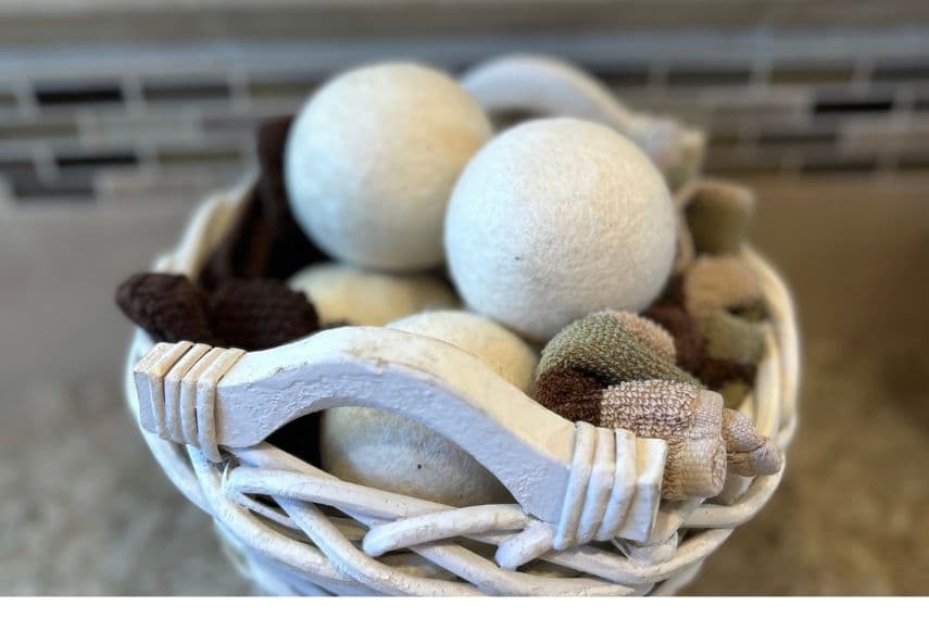 Basket of wool dryer balls on countertop.