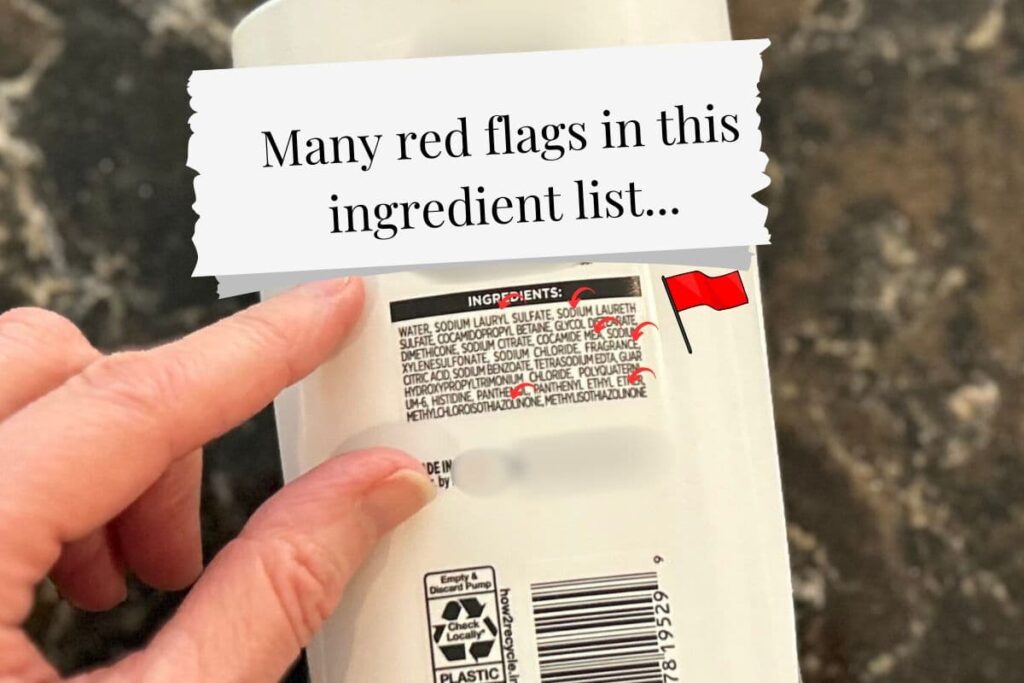 Hand pointing to ingredients list, red arrows show red flag ingredients.