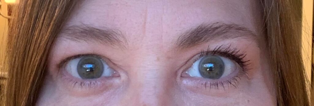 Tina's eye comparison from first time using Think Big Mascara and brow gel.