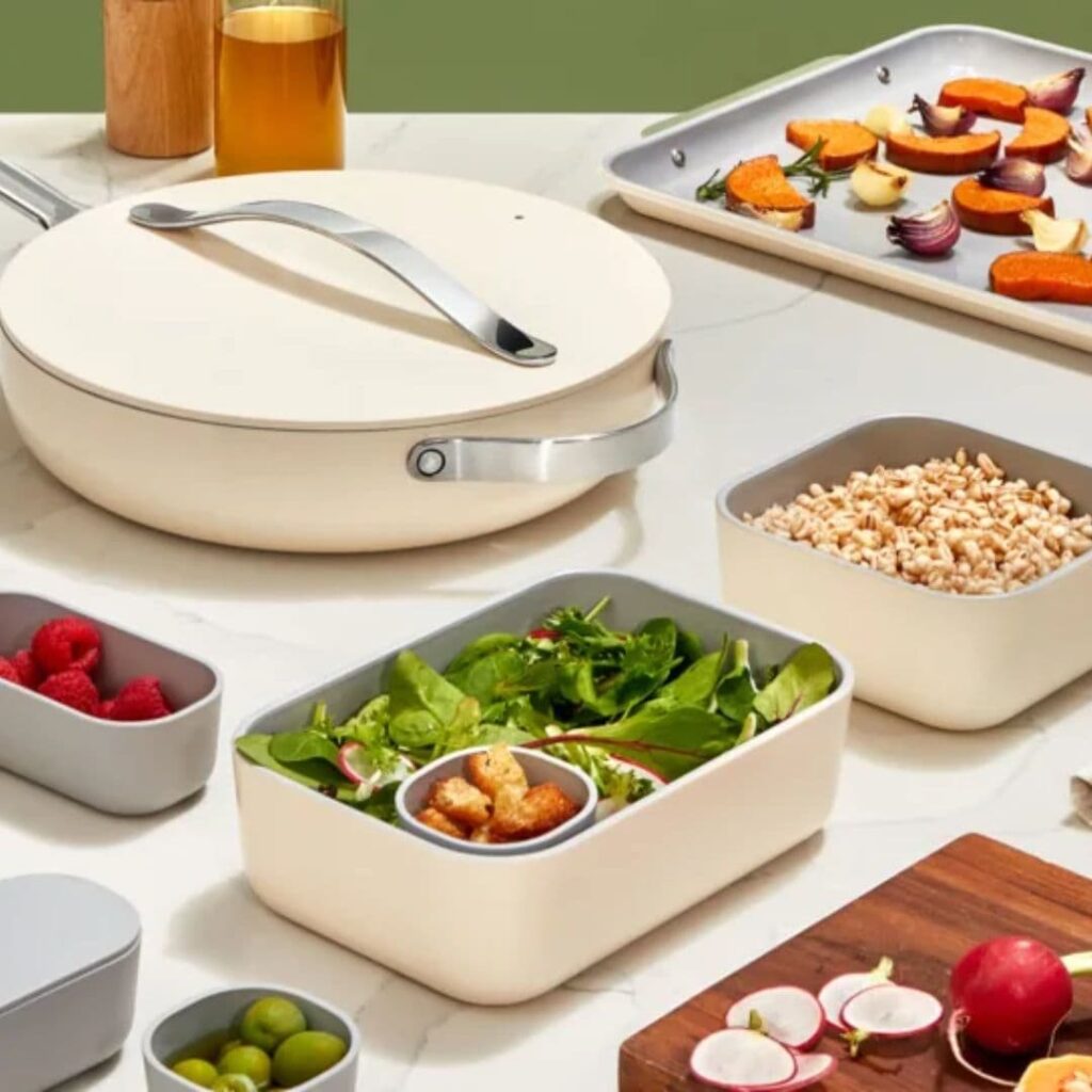 Items from Caraway meal prep bundle with cookware set and food storage containers.