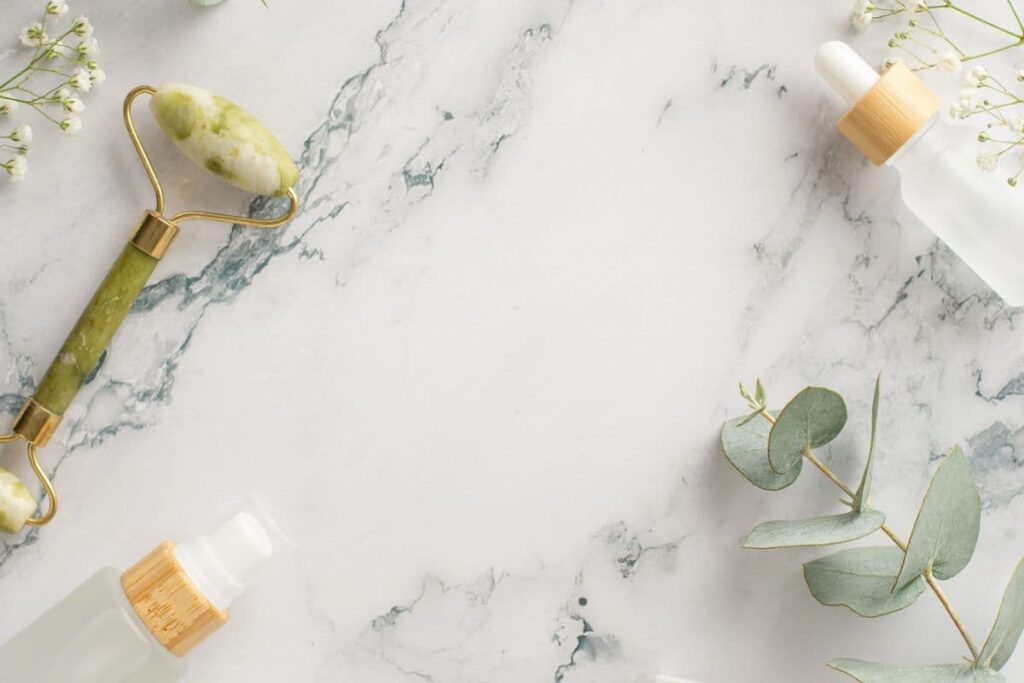 Natural skincare products on counter, safer alternatives to retinol.