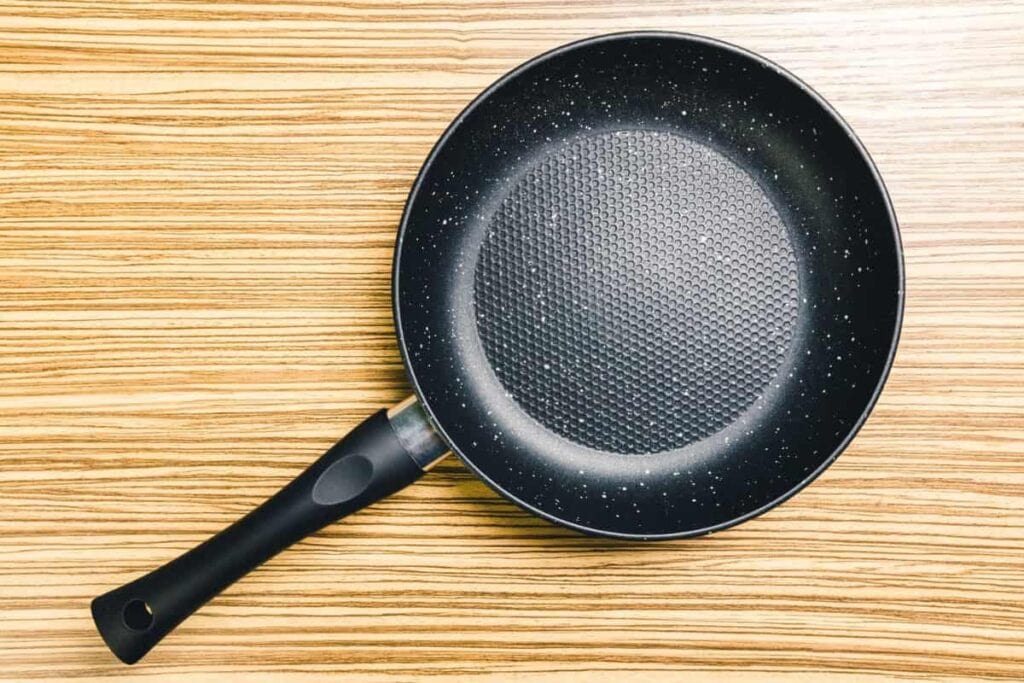 Teflon non-stick pan on counter. Replacing this is the first priority for a non toxic kitchen.