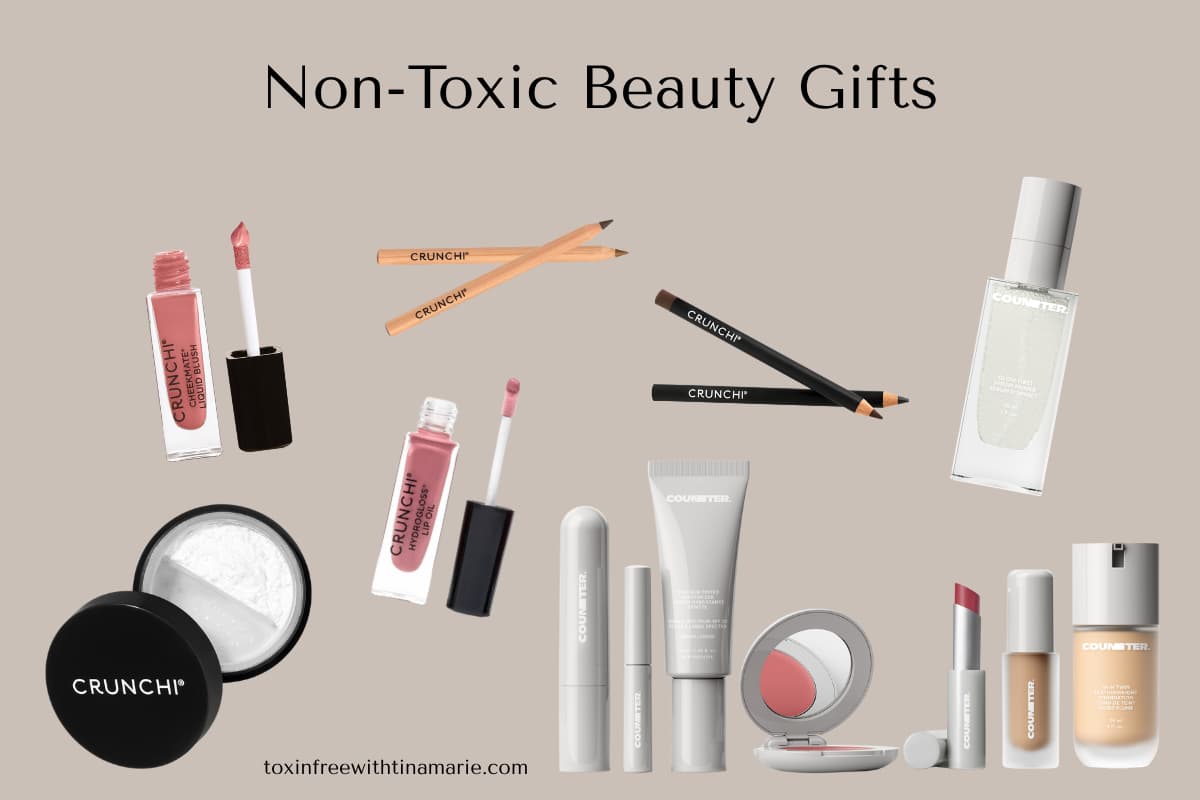 Assorted non-toxic beauty products on a neutral background, featuring lip gloss, pencils, creams, and bottles. Text reads "Non-Toxic Beauty Gifts."