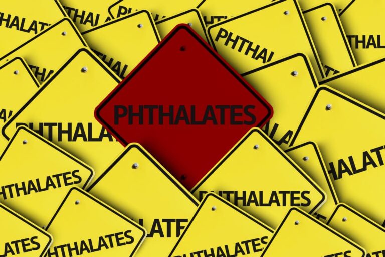 Phthalates written on multiple road sign, including a red sign, indicating warning